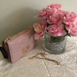 Bebe Abigail Crossbody bag in mauve. NWT